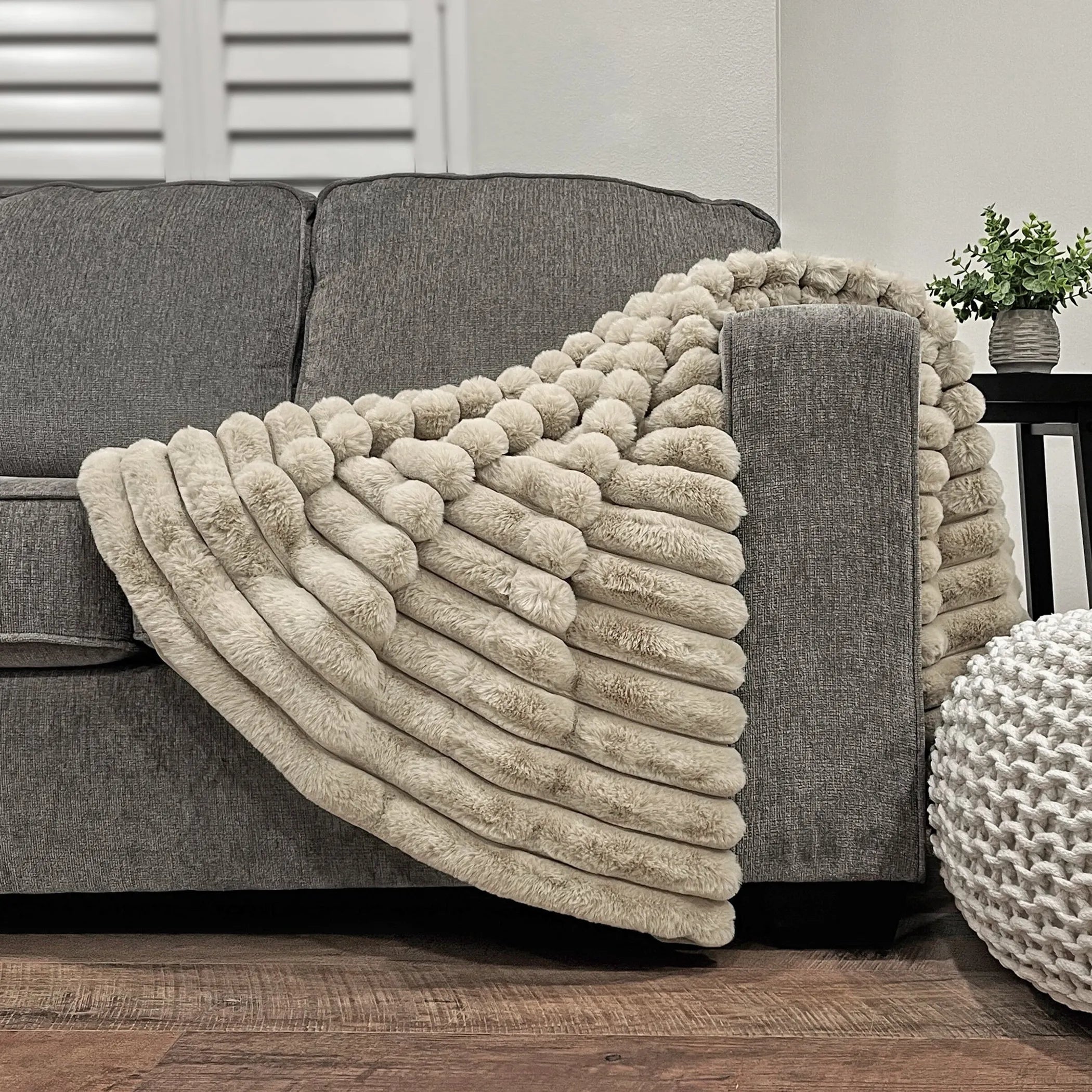 PUFFY FAUX FUR THROW